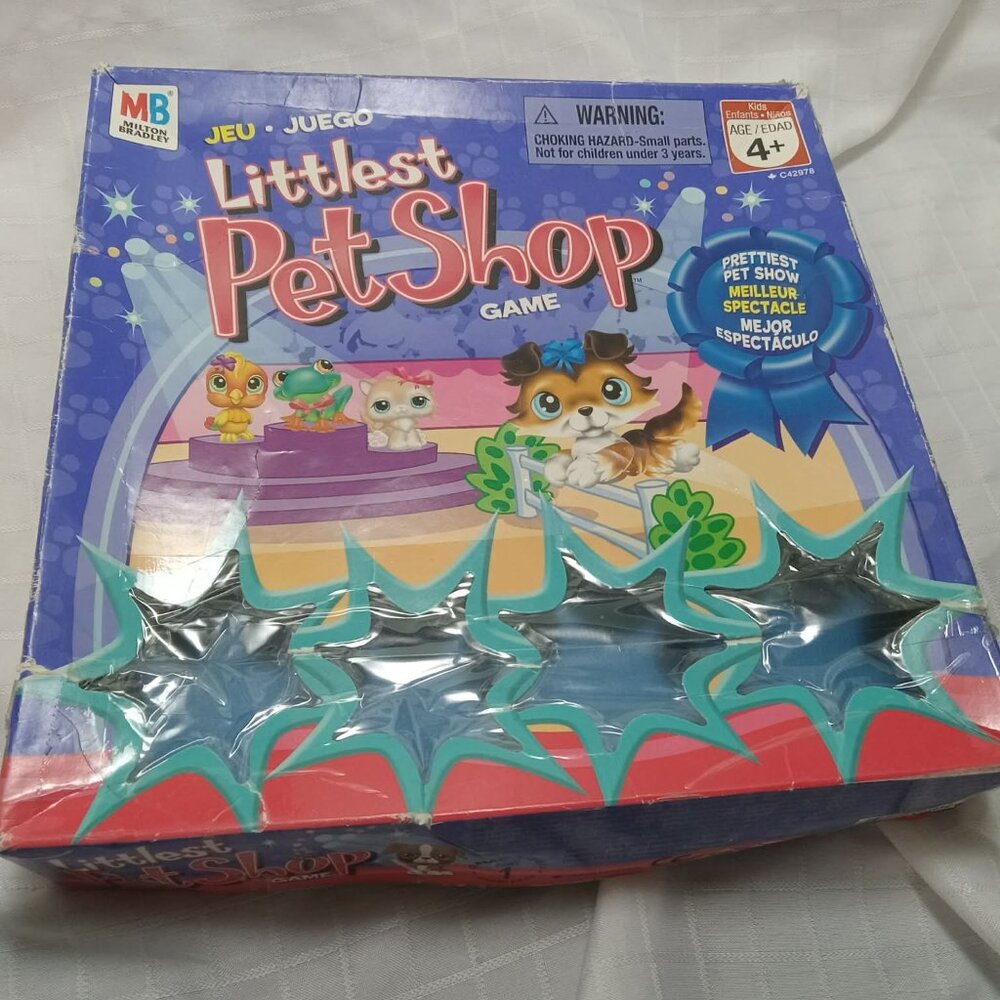 The box, spinner, and game board for Littlest Pet Shop Vintage Game
